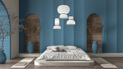 Beige and blue concrete molded plaster wall in zen eastern bedroom with master bed, lamps and decors. Cozy background with copy space. Relax showcase, interior design concept idea