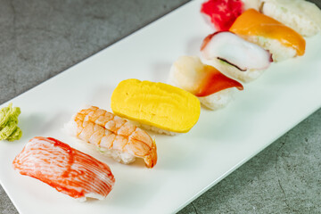 Japanese food, fresh sushi dish on white plate