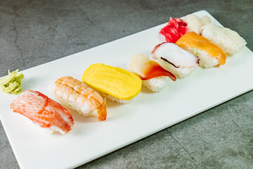 Japanese food, fresh sushi dish on white plate