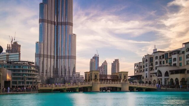 sunset dubai world tallest building fountain palace hotel bay panorama 4k timelapse uae