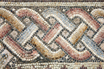 Roman mosaic abstract border background of the 2nd century in Kato Paphos (Pafos) Cyprus which is a popular tourist holiday travel destination and landmark attraction, stock photo image