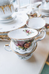 Obraz na płótnie Canvas Fine afternoon English bone china afternoon tea cups and saucers.