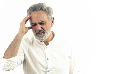 Middle aged man struggling from migreine - headache - studio shot isolated on white background....