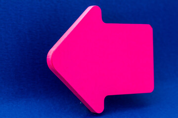 Pink arrow on blue