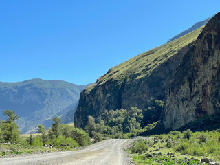 The road goes into the distance in the mountains, Altai, Russia