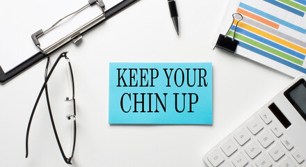 Stickers with chart,calculator and paper with text KEEP YOUR CHIN UP on the white background