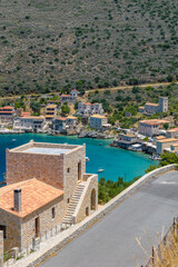 Fototapeta na wymiar Panoramic view of Limeni village. The picturesque villlage with the turquoise waters and the stone buildings under Areopoli, peloponnese , Greece.