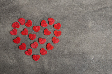 Valentine's Day greetings concept. Little red hearts makes big one. Valentines greeting card.