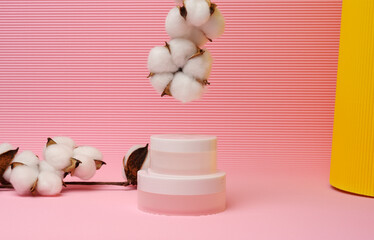 white jar for cosmetics on a pink background. Packaging for cream, gel, serum, advertising and product promotion, mock up