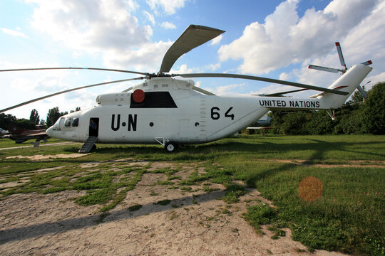 Exterior view of a Mil Mi-26 "Halo" super heavy-lift helicopter with United Nations livery painting at the Zhulyany State Aviation Museum of Ukraine