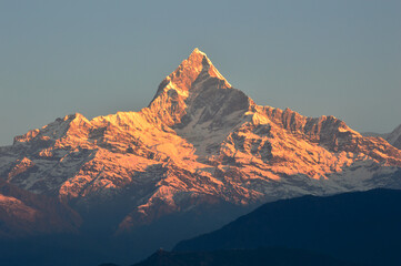 Mesmerizing view of mountain Fishtail at the time of sunrise was seen from roof top of the house.