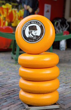 Amsterdam, Netherlands - 7th July 2014: A stack of Gouda cheese outside of the Henry Willig store in Amsterdam.