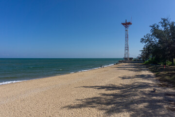 The radio tower is located along the coast.