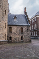 Fragments of Ridderzaal (Hall of Knights, XIII century) in Binnenhof (Inner court) - XIII century complex of buildings in the city center of Den Haag (The Hague). The Netherlands.