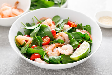 Shrimps spinach tomato fresh salad, low carb ketogenic, keto diet. Healthy food