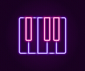 Glowing neon line Music synthesizer icon isolated on black background. Electronic piano. Colorful outline concept. Vector