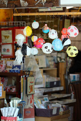 Shop entrance of the Japanese paper with cute and funny colorful paper balloons hanged.