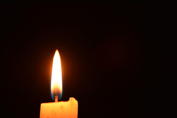 Candle light in darkness as light for life