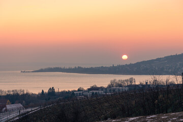Beautiful winter landscape of the Badacsony hill next to the Lake Balaton from above with an...