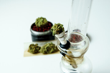 Close-up of medical marijuana buds on white background. Concept of herbal and alternative medicine