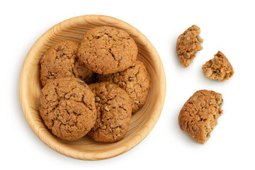 oatmeal cookies with flax, pumpkin and sunflower seeds in wooden bowl with clipping path and full depth of field. Top view. Flat lay