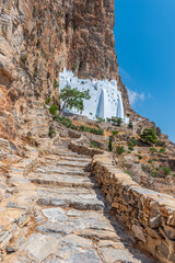 The famous Hozoviotissa Monastery standing on a rock over the Aegean sea in Amorgos island, Cyclades, Greece.