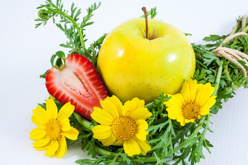 Yellow apple and strawberries