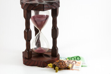 Hourglass and money