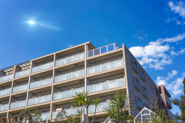Exterior of high-rise condominium and refreshing blue sky scenery_13