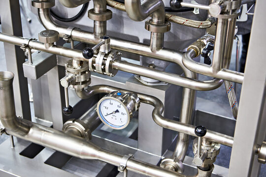 Metal pipes and pressure gauge industrial