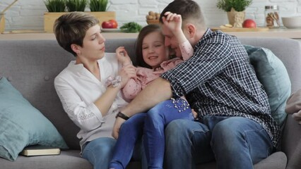 Happy, Happy, mom, dad, messing, around, their, little, daughter enjoying freemom, dad, messing, around, their, little, daughter enjoying free time playing home Weekend activities family image concept