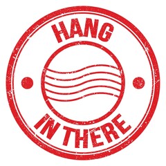 HANG IN THERE text on red round postal stamp sign