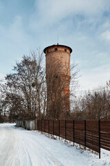 Abandoned Soviet water tower in winter