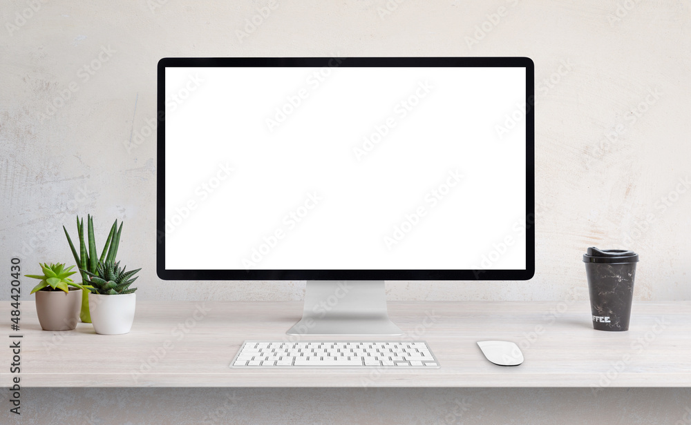 Poster Computer display on work desk with white, isolated screen for web page presentation