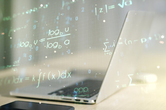 Creative scientific formula hologram on modern laptop background, research concept. Multiexposure