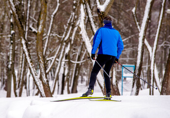 A man goes skiing in the winter Park
