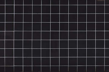 Black tile texture with white seams - obrazy, fototapety, plakaty