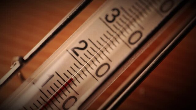 4K, temperature increase measured with old glass thermometer on Celsius scale