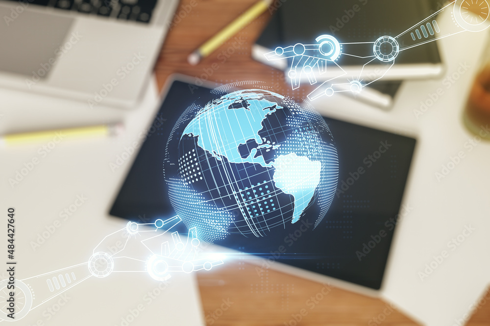 Fototapete creative abstract robotics technology hologram with globe and modern digital tablet on desktop on ba