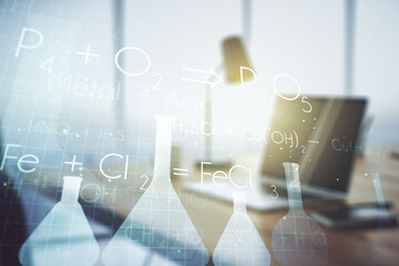 Creative chemistry concept on modern laptop background. Multiexposure