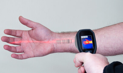 scanner reads a barcode on a man's arm