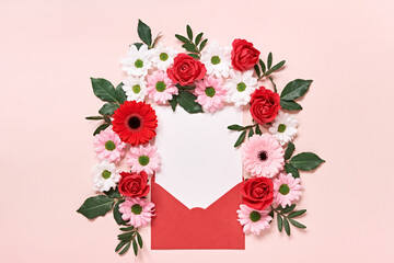 Red envelope with Romantic love letter mockup and flowers on pink background