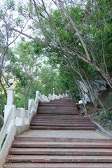 Obraz premium View of stairs to the Cristo Rei statue located on the top of the hill at the end of the Fatucama peninsula, Dili, Timor Leste.