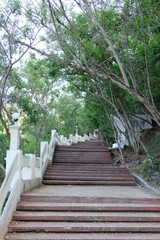 View of stairs to the Cristo Rei statue located on the top of the hill at the end of the Fatucama peninsula, Dili, Timor Leste.