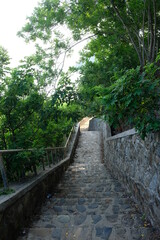 View of stairs to the Cristo Rei statue located on the top of the hill at the end of the Fatucama peninsula, Dili, Timor Leste.