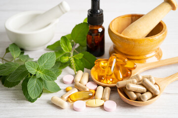 Alternative medicine herbal organic capsule with vitamin E omega 3 fish oil, mineral, drug with...