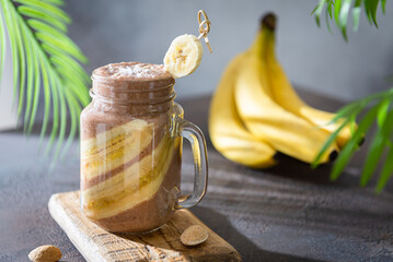 Chocolate banana coconut hazelnut milkshake or smoothie. Healthy organic drink. Banana chocolate...