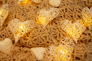 Heart-shaped lights and heart-shaped soap on a scarf. Love valentine concept
