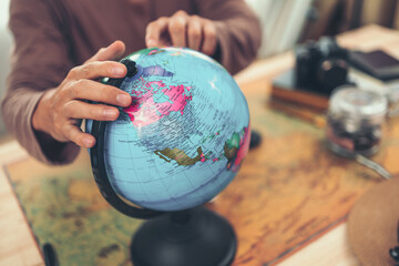 Hand catch and Finger point Globe, whole world.Travel , Adventure and Discovery concept.
