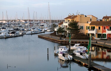 apartments at a sea harbour in the sunset